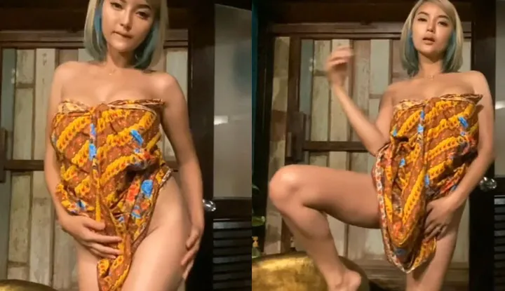 Just draped in a piece of cloth, playing with my hair and posing effortlessly~
